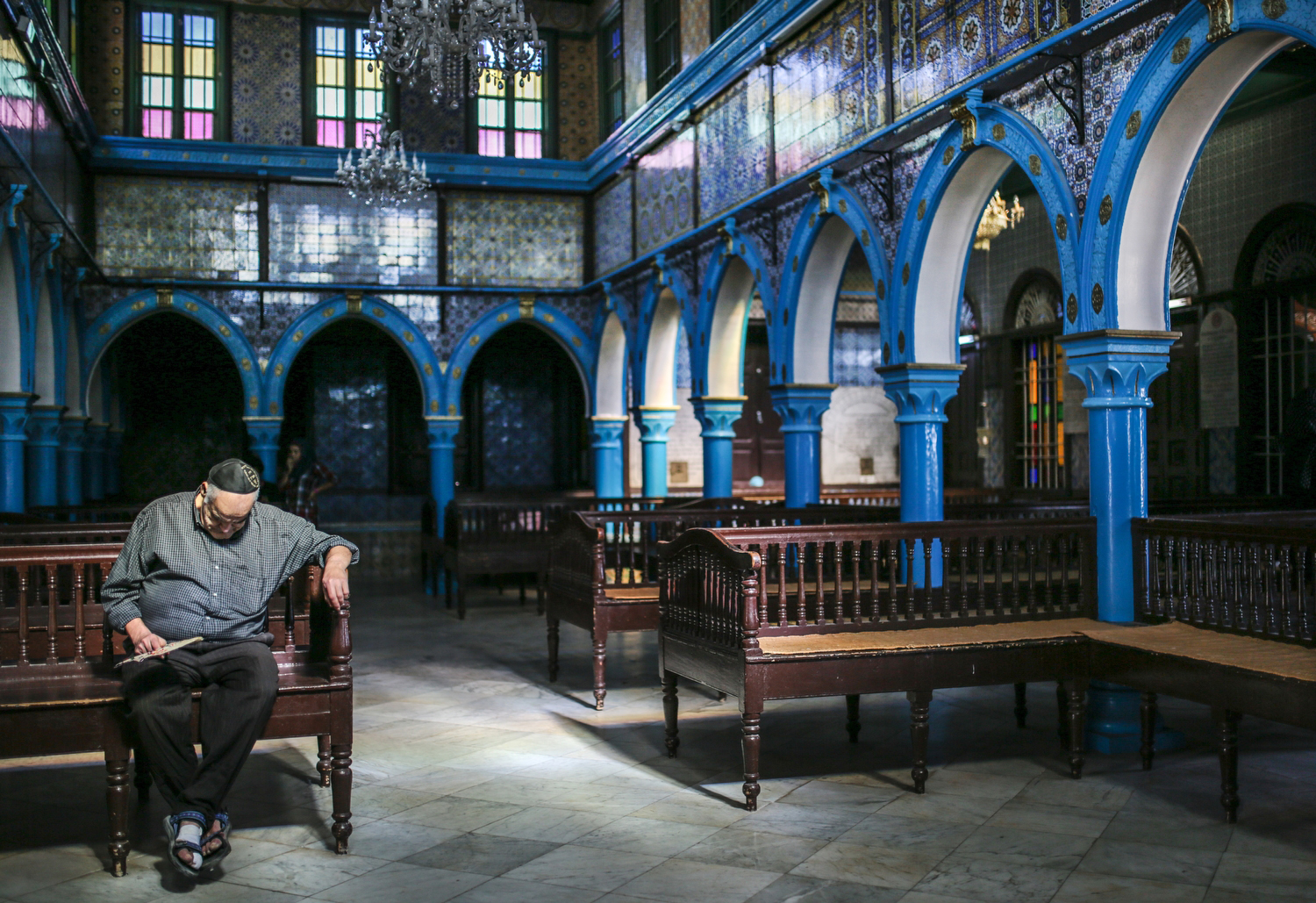 A Jewish man prays in a synagogue on the island of Djerba in Tunisia—one of a handful of Jews remaining in the Arab world after 800,000 were forcibly exiled or fled after their citizenship was revoked by the Arab League in 1946. No aid, compensation or other redress has ever been granted these refugees. 