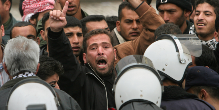 Unemployed Palestinians charge Palestinian police during Gaza protests. Despite billions of dollars in international welfare, unemployment in Gaza is 56% and 18% in the West Bank. Economic malfeasance by Palestinian rulers is one of many obstacles undermining chances of a Palestinian state.