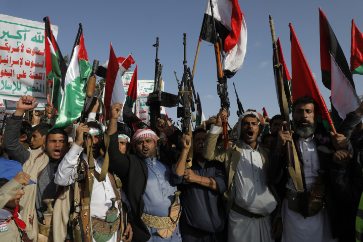 Houthi supporters demonstrate in support of the Palestinians. The Houthis are part of Iran’s “Axis of Resistance,” along with Hamas and Hezbollah. They have been attacking commercial ships in the Red Sea in support of Hamas’s war against Israel, endangering the global economy.