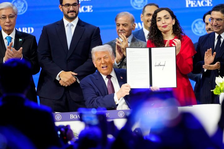 President Trump displays signed charter of the Gaza Board of Peace at the World Economic Forum in Davos, Switzerland. But his plan to bring peace to Gaza may be doomed to fail, since it requires, above all, that Hamas be disarmed—which, without a miracle, seems impossible.