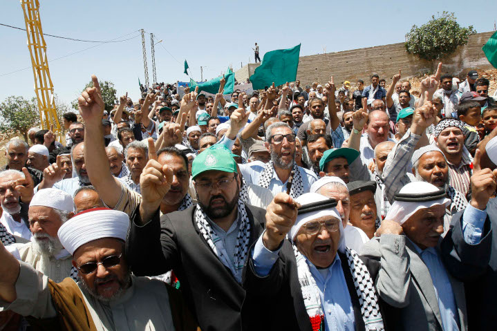 Palestinian demonstrators in Lebanon shout slogans at a Hamas-organized anniversary of the “Nakba”—Arabic for “catastrophe”—lamenting the fact that some 700,000 Arabs fled or were expelled from Israel when five Arab armies attacked the new Jewish state in 1948. 