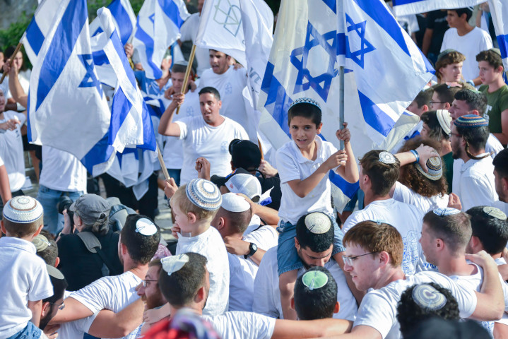 Jerusalem Day Flag Parade marchers in the Old City celebrate their city’s 1967 reunification—declining the U.S. request for a route that would avoid Arab areas of the city.  Despite threats of militant reprisals by Palestinians, the event was largely free of violence.