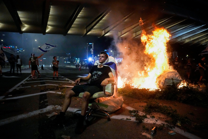 Demonstrators who oppose reform efforts intended to democratize Israel’s judicial system made bonfires to block traffic of major highways. U.S. President Biden has also attacked Israel’s democratically elected government for such reforms.