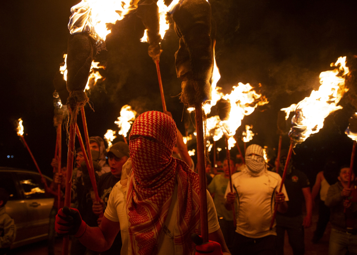 Palestinian militants demonstrate against a new Jewish community in the ancient Jewish homeland of Judea and Samaria. Though Palestinians have historically never had sovereignty over territory in the Holy Land, they claim all of it, insisting no Jews be allowed to live there.