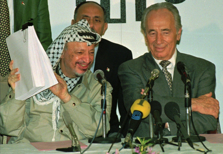 PLO leader Yasser Arafat and Israel Foreign Minister Shimon Peres sign final phase of the Oslo Accords in 1995. While ostensibly a peace plan. Arafat bragged that the Accords were simply a phase in his scheme to have the “Jews fleeing from Palestine like mice from a sinking ship.”