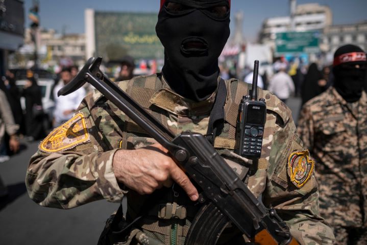 Iran Revolutionary Guard Corps (IRGC) members march in Tehran, fortifying the Islamic Republic’s obsession with ethnically cleansing “infidels” from former Muslim-ruled lands, such as “Palestine.” This fanatical religious mission makes Western peace efforts impossible. 