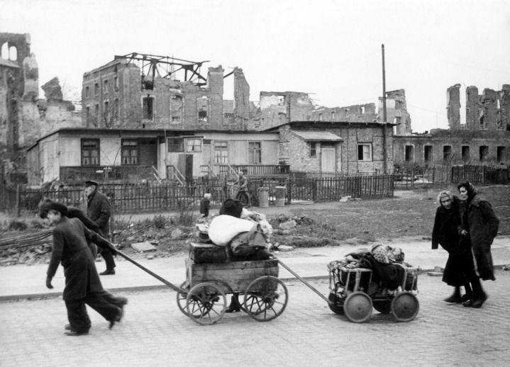 Refugees walking through Berlin following the end of World War II. After the war, Germany and Japan went through a complete cultural/political makeover. A similar makeover for Gaza after Hamas is deposed is needed if the Palestinians are ever to make peace with Israel. 