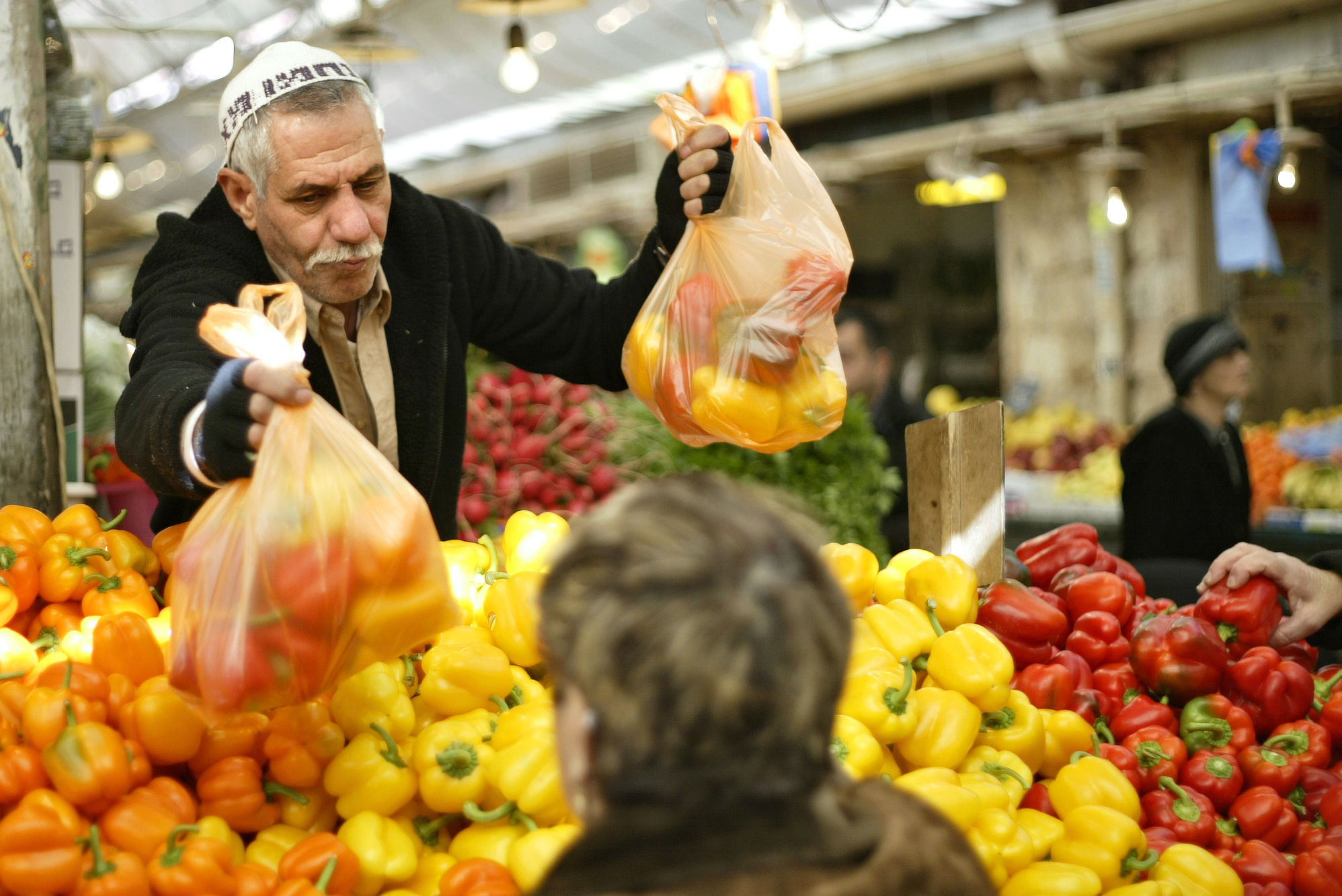 Iraqi-born Jew, Bibi Nissim, serving customers in Jerusalem’s Mahane Yehuda market. He’s one of millions of Middle Eastern Mizrahi Jews who make up the majority of Israel’s population, dispelling the myth that Israel was formed mainly by and for European Ashkenazi Jews.
