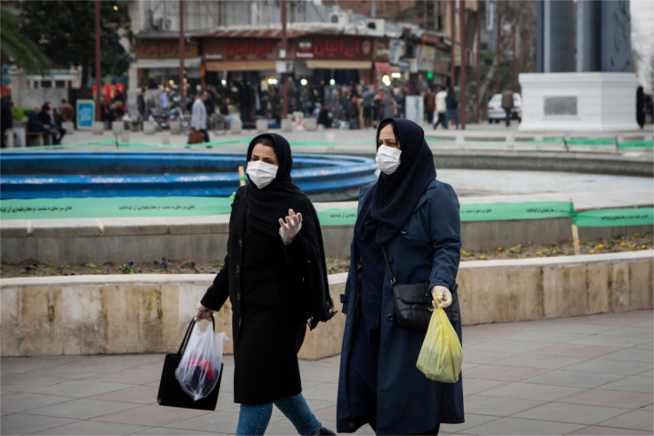 Largely empty streets and squares mark many Iranian cities.  Here, two women return home in in the Iranian city of Rasht, which has the largest number of COVID-19 cases and the highest mortality rate in Iran.  Its main hospital is full, its chief executive is among the dead, and the hospital is not accepting new patients.