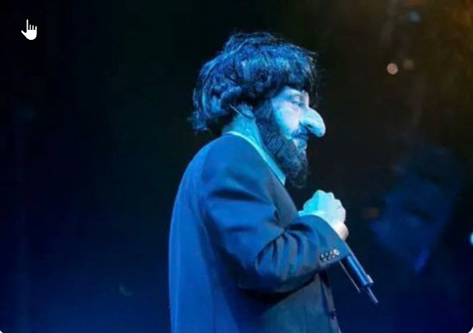 Cancel culture or good business? Rapper Macklemore performed as a hairy, huge-nosed Jew caricature, supporting his antisemitic and anti-Israel messages onstage. Such hateful diatribes caused his firing from Ed Sheeran’s U.S. tour. (Credit:Flickr/Drew of The Come Up Show)