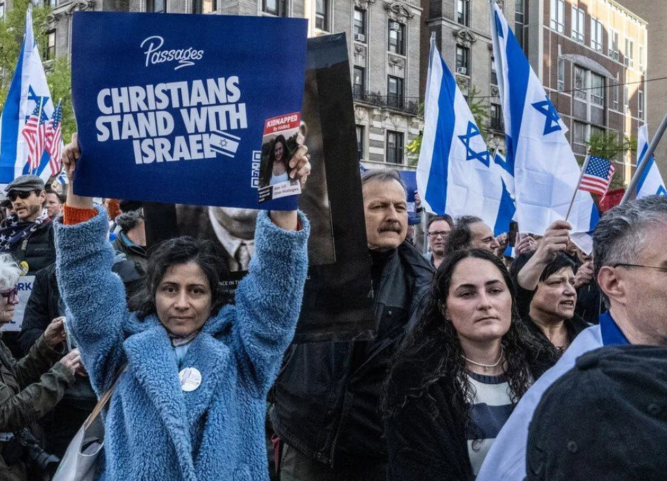 Christian woman shows support for the Jewish state at a Passages Israel event. American Christians comprise the single largest support group for Israel in the U.S., forming a powerful, vocal voting bloc that has been known to sway elections in favor of pro-Israel candidates.
