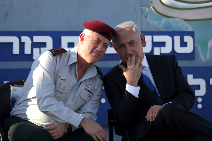 In more cordial Israeli pre-electoral times, then-IDF Chief of Staff Benny Gantz (Lt. Gen.-ret.) talks with his boss, Prime Minister Bibi Netanyahu. Now, the two Benjamins are fighting one another to become Israel’s next Prime Minister. Gantz out-polled Netanyahu in last week’s Knesset election, with 33 seats to Bibi’s 31. Who will be the next Israeli Prime Minister? Ironically, with only eight seats in the new Knesset, Russian-Israeli leader Avigdor Lieberman may well decide.