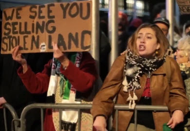 Anti-Israel protestor yells “Go kill yourself” to Jews being escorted to the entrance of New York’s Park East Synagogue. Such belligerent actions have increased dramatically, as has their tendency to injure Jews, damage property and forcefully prevent rights of assembly and speech. 